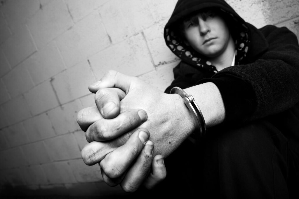 teen in handcuffs